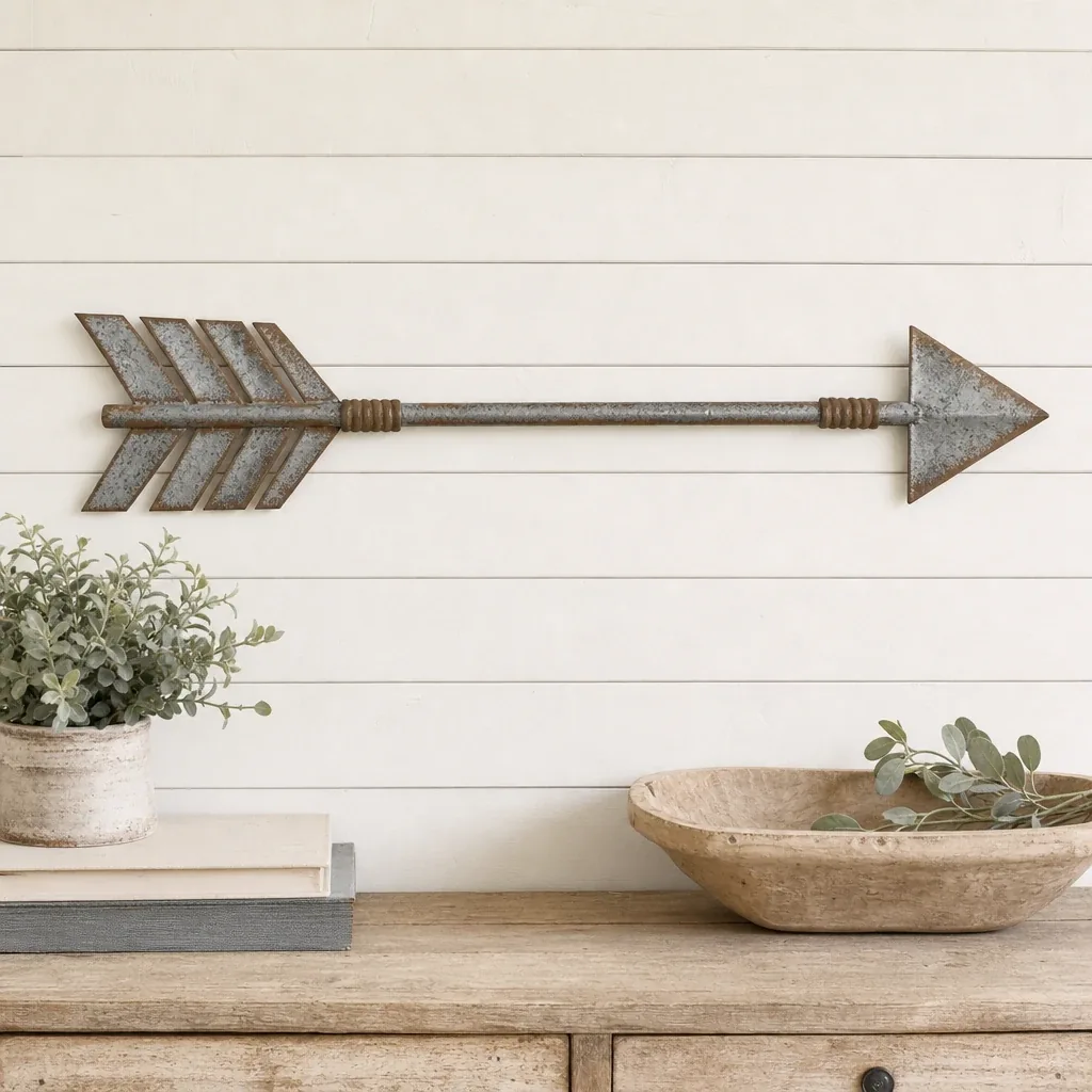 Distressed Metal Arrow styled on a softly lit farmhouse surface